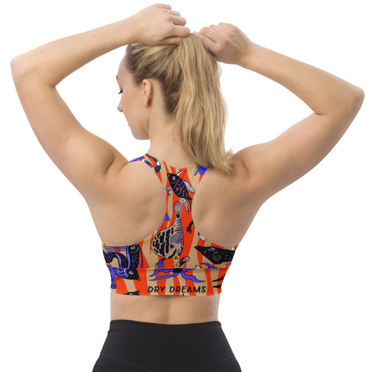Back view of a woman wearing the Wild Catch recycled sports bra