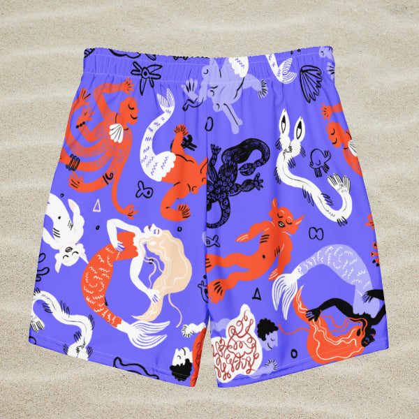 Blue swimming trunks with bright coloured illustrations of sea creatures and mermaids.