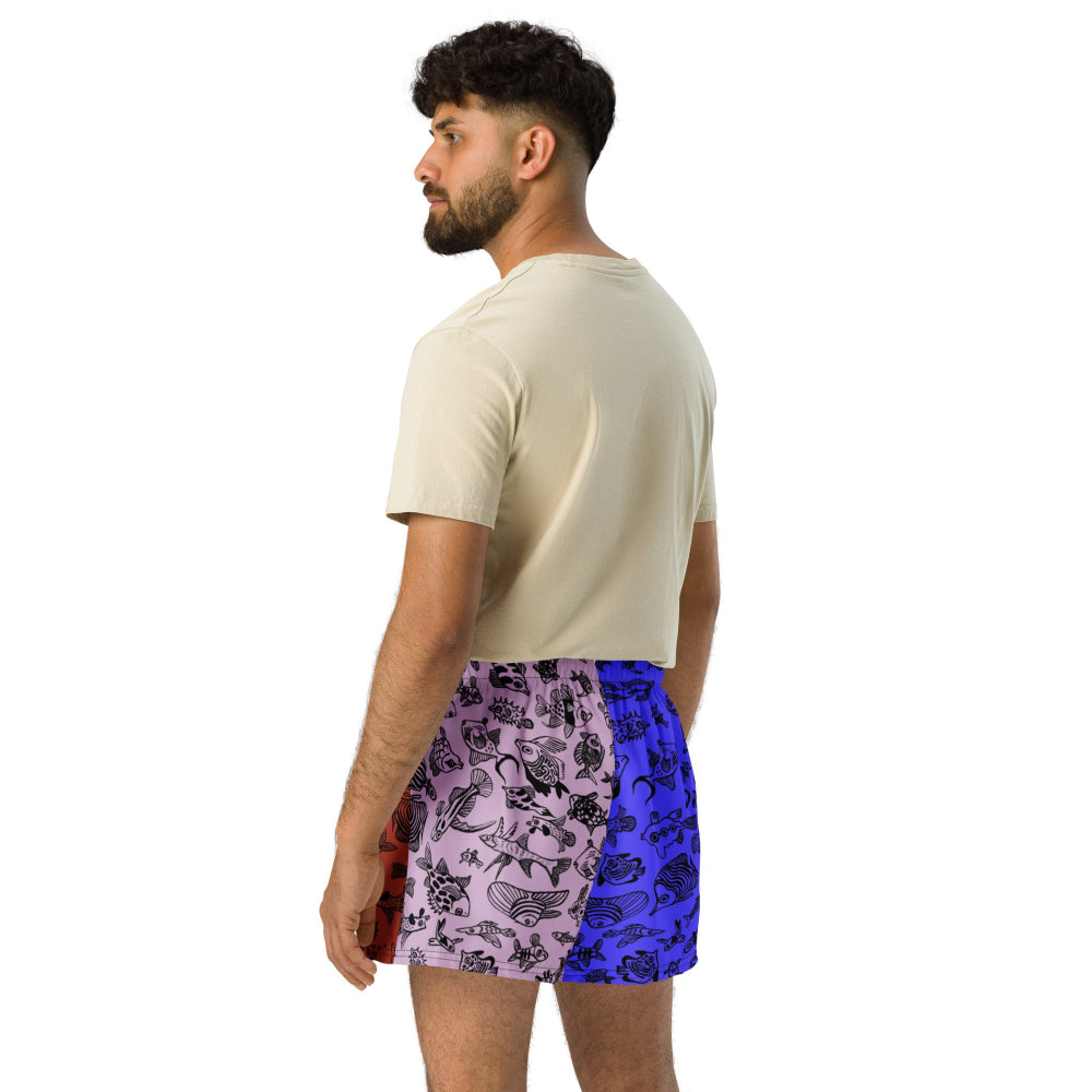 Back view of a man wearing the Harlequin recycled unisex shorts