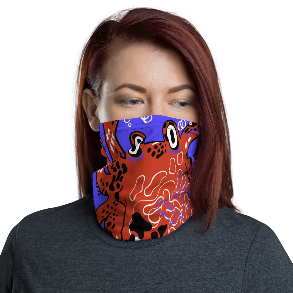 A woman wearing the Octopus Buff as a face covering with an octopus design