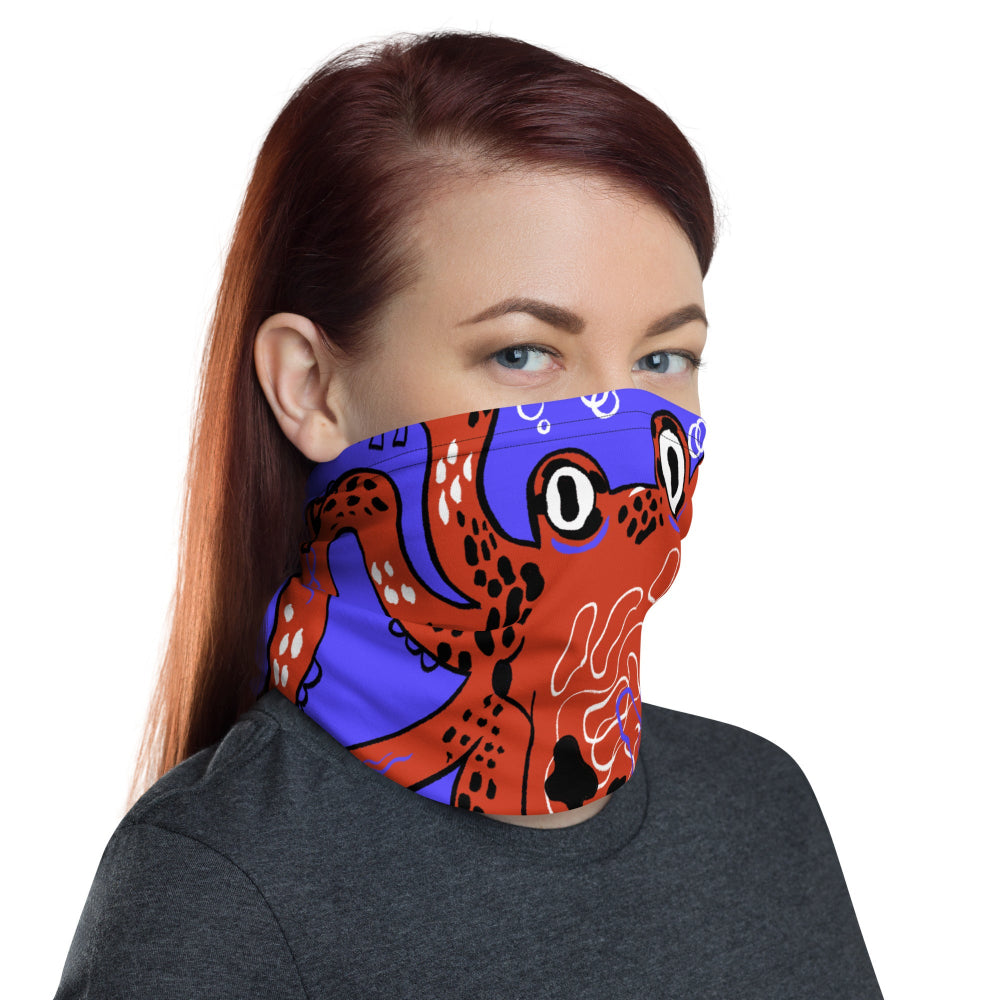 Side view of a woman wearing the Octopus Buff as a face covering