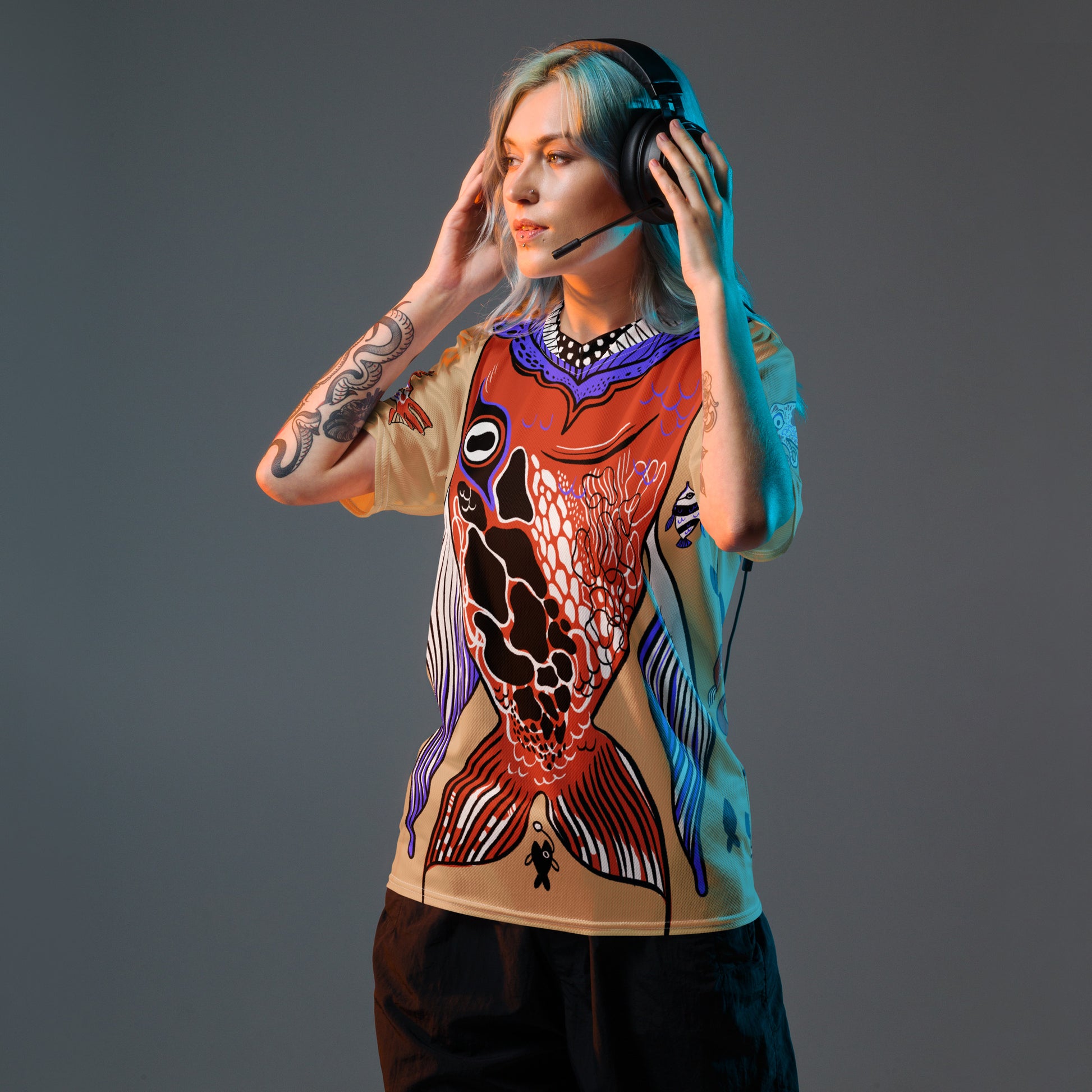 A woman wearing the Swallowed By a Fish recycled unisex T-shirt, front view