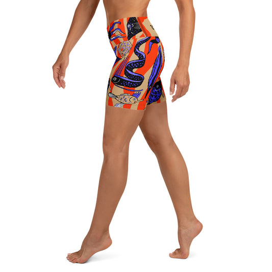 Left side view of the Wild Catch yoga shorts showing the fit and striped fish pattern